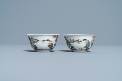 A fine Chinese 'landscape' teapot and a pair of cups and saucers, Yongzheng
