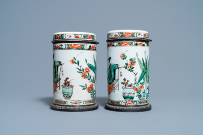 A pair of Chinese silver-mounted cylindrical famille verte covered jars, Kangxi