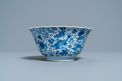 A Chinese blue and white lobed 'carps and crab' bowl, Kangxi