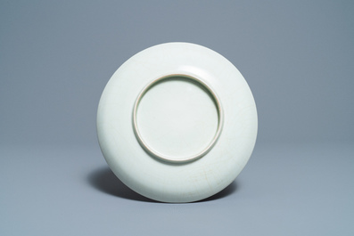A Chinese monochrome celadon underglaze 'dragon' dish, Qianlong/Jiaqing