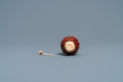 A Chinese pine cone and bone snuff bottle, 19/20th C.