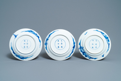 Five Chinese blue and white figurative plates, Kangxi and Chenghua marks, Kangxi