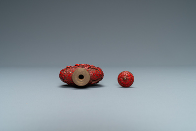 A Chinese carved red cinnabar lacquer 'boys at play' snuff bottle, imperial workshops, Qianlong/Jiaqing