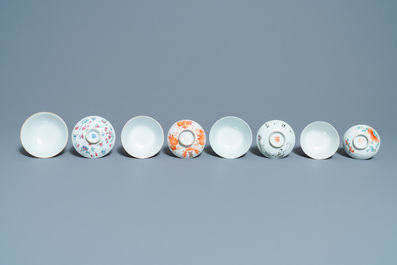 Eight Chinese famille rose and iron-red covered bowls with two stands, 19th C.