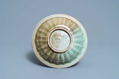 A Chinese celadon 'twin fish' dish, Song/Yuan
