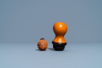 Six Chinese carved fruit pits, a walnut snuff bottle and a gourd cricket box, 19/20th C.