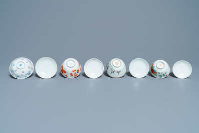Eight Chinese famille rose and iron-red covered bowls with two stands, 19th C.