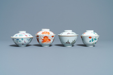 Eight Chinese famille rose and iron-red covered bowls with two stands, 19th C.