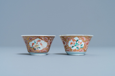 Two Chinese famille rose cups and seven saucers, Yongzheng