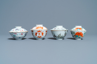 Eight Chinese famille rose and iron-red covered bowls with two stands, 19th C.