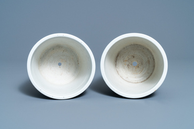 A pair of Chinese famille rose jardini&egrave;res and a Canton famille rose celadon dish, 19th C.