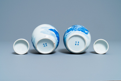 A pair of Chinese blue and white covered jars and a pair of famille rose vases, 19th C.