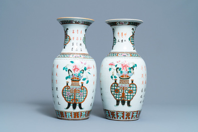 A pair of Chinese blue and white covered jars and a pair of famille rose vases, 19th C.
