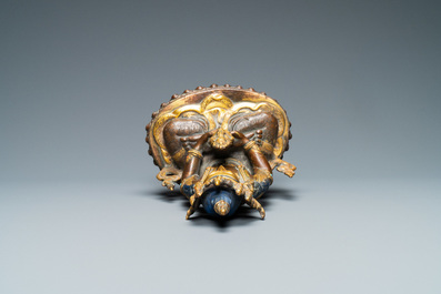 Une figure de Bouddha en alliage de cuivre partiellement dor&eacute; et incrust&eacute; de corail et turquoise, N&eacute;pal, 19/20&egrave;me