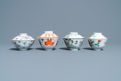 Eight Chinese famille rose and iron-red covered bowls with two stands, 19th C.