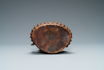 Une figure de Bouddha en alliage de cuivre partiellement dor&eacute; et incrust&eacute; de corail et turquoise, N&eacute;pal, 19/20&egrave;me