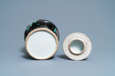 A Chinese famille noire vase and cover, 19th C.