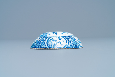 A ribbed Dutch Delft blue and white chinoiserie brush back, 18th C.