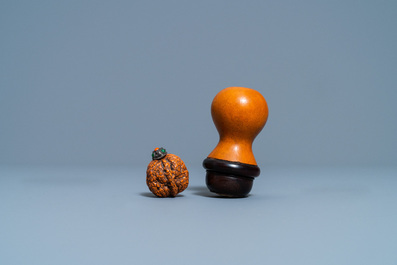 Six Chinese carved fruit pits, a walnut snuff bottle and a gourd cricket box, 19/20th C.