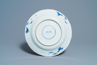 A Chinese blue and white 'lotus' dish and a famille verte dish, Kangxi