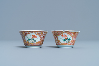 Two Chinese famille rose cups and seven saucers, Yongzheng
