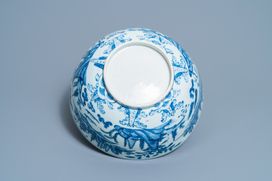 A large Chinese blue and white 'river landscape' bowl, Ming
