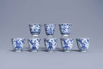 Eight Chinese blue and white cups and saucers, Kangxi