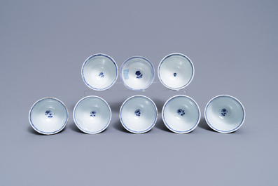 Eight Chinese blue and white cups and saucers, Kangxi