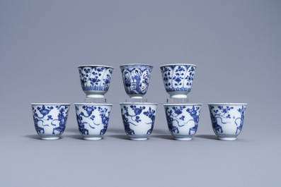 Eight Chinese blue and white cups and saucers, Kangxi