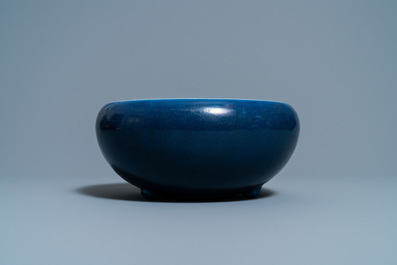 A Chinese monochrome blue censer and a white slip-decorated celadon vase, 18/19th C.
