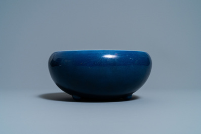 A Chinese monochrome blue censer and a white slip-decorated celadon vase, 18/19th C.