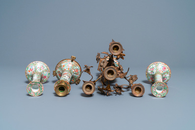 Three Chinese Canton famille rose candlesticks and a vase with gilt bronze mounts, 19th C.