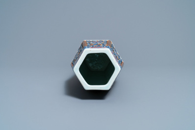 A Chinese hexagonal blue, white and copper-red brown-ground vase, 19th C.