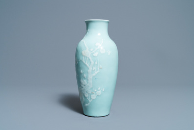 A Chinese monochrome blue censer and a white slip-decorated celadon vase, 18/19th C.