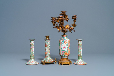 Three Chinese Canton famille rose candlesticks and a vase with gilt bronze mounts, 19th C.