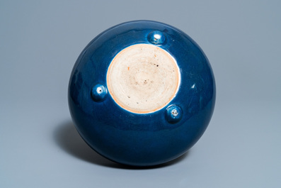 A Chinese monochrome blue censer and a white slip-decorated celadon vase, 18/19th C.
