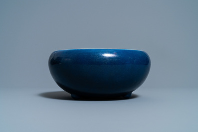 A Chinese monochrome blue censer and a white slip-decorated celadon vase, 18/19th C.