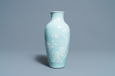 A Chinese monochrome blue censer and a white slip-decorated celadon vase, 18/19th C.