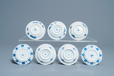 Nineteen Chinese blue and white cups and twenty-one saucers, Kangxi and later