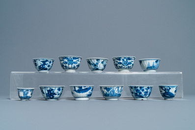 Nineteen Chinese blue and white cups and twenty-one saucers, Kangxi and later