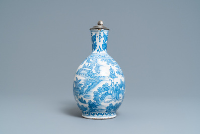 A large Dutch Delft blue and white chinoiserie jug with pewter cover, 17th C.