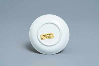 A Chinese famille rose 'tea scene' cup and saucer, Yongzheng/Qianlong