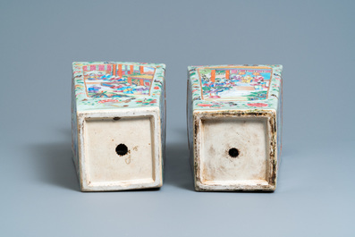 A pair of Chinese square famille rose celadon-ground vases on gilt bronze feet, 19th C.