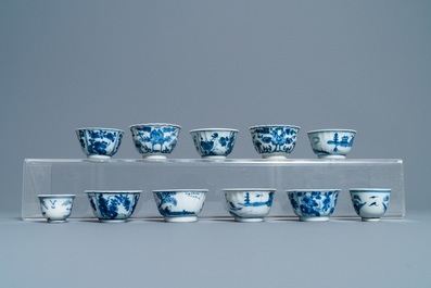 Nineteen Chinese blue and white cups and twenty-one saucers, Kangxi and later