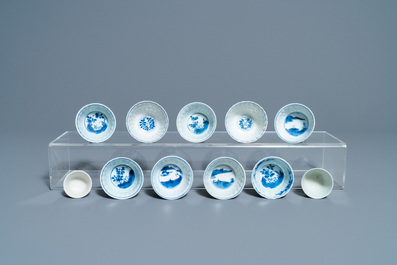 Nineteen Chinese blue and white cups and twenty-one saucers, Kangxi and later