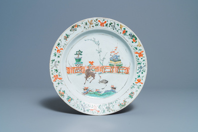A Chinese famille verte dish and a wucai jar, Kangxi and Transitional period