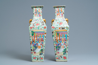 A pair of Chinese square famille rose celadon-ground vases on gilt bronze feet, 19th C.