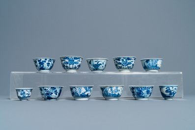 Nineteen Chinese blue and white cups and twenty-one saucers, Kangxi and later