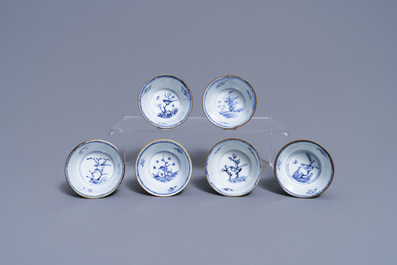 Six Chinese blue, white and copper-red cups and saucers, Kangxi