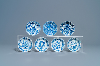 Nineteen Chinese blue and white cups and twenty-one saucers, Kangxi and later